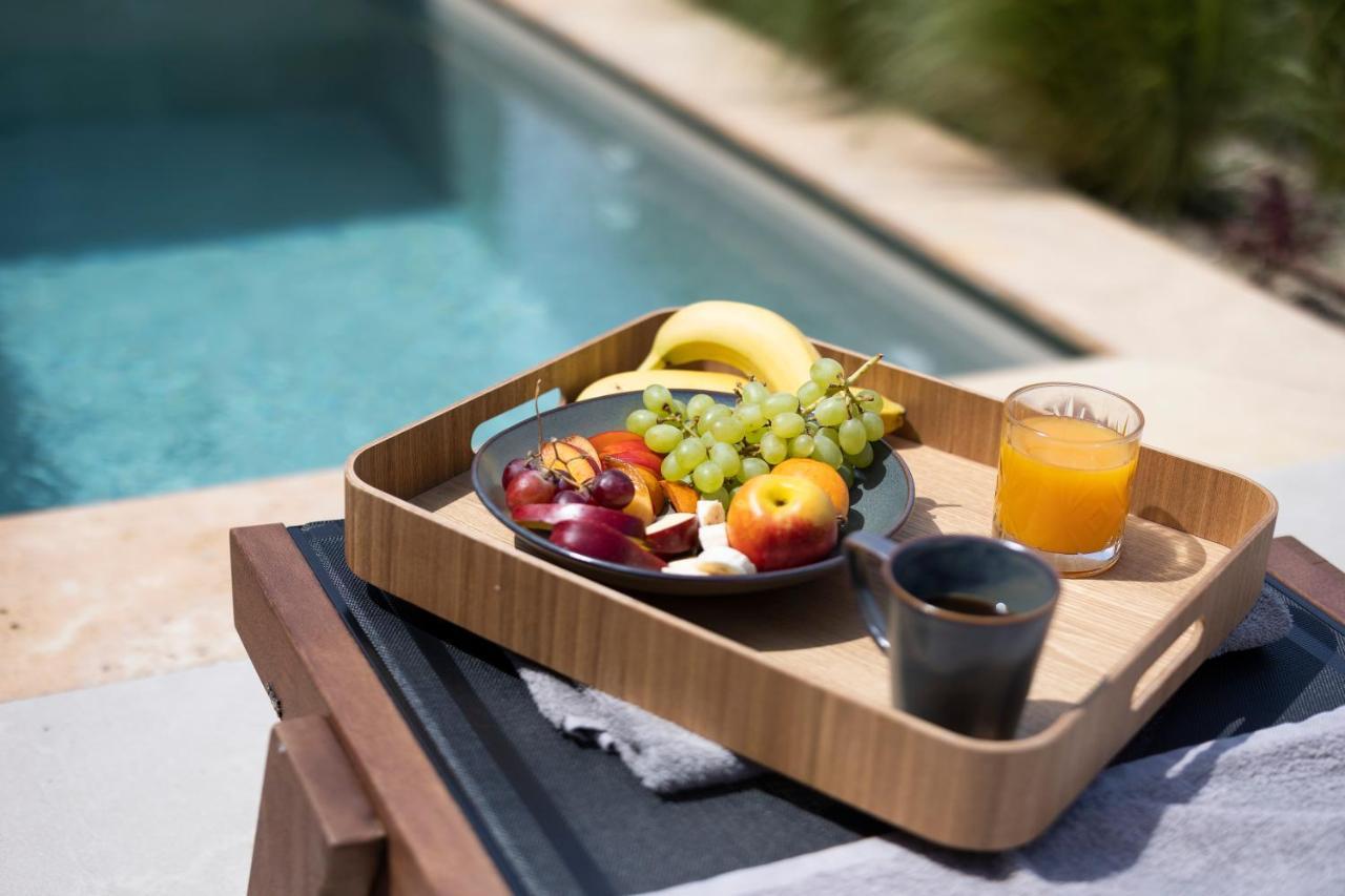 Pnoes Luxury Suites ปัลลูรี ภายนอก รูปภาพ