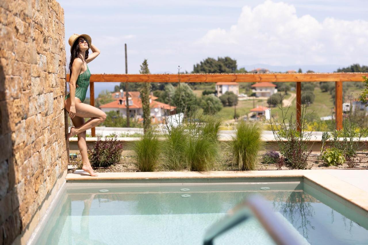 Pnoes Luxury Suites ปัลลูรี ภายนอก รูปภาพ