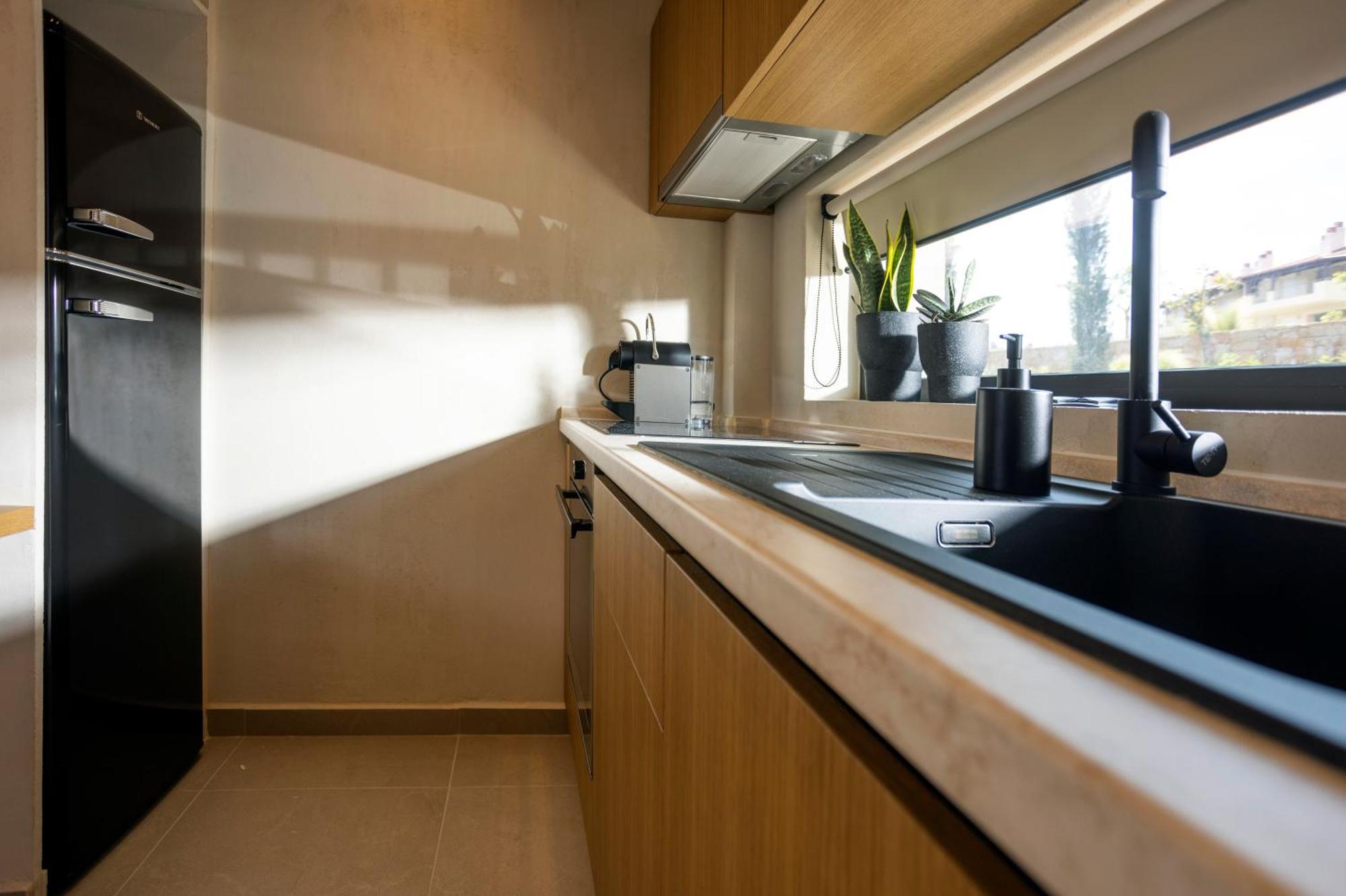 Pnoes Luxury Suites ปัลลูรี ภายนอก รูปภาพ